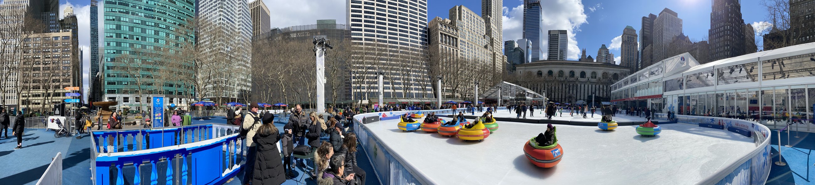 Skaters and bumper cars on the Bryant Park rink